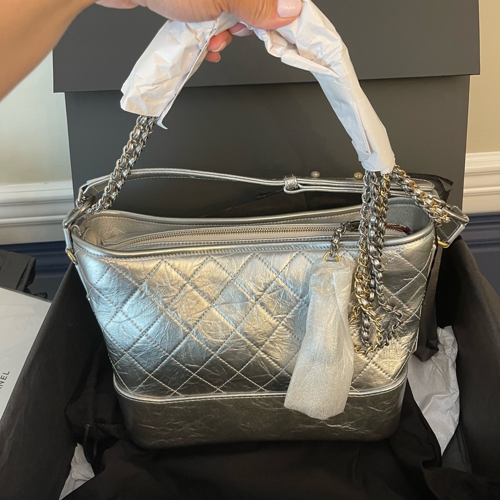 Brand new with Box and tags Chanel Handbag never worn. Gabrielle Chanel medium